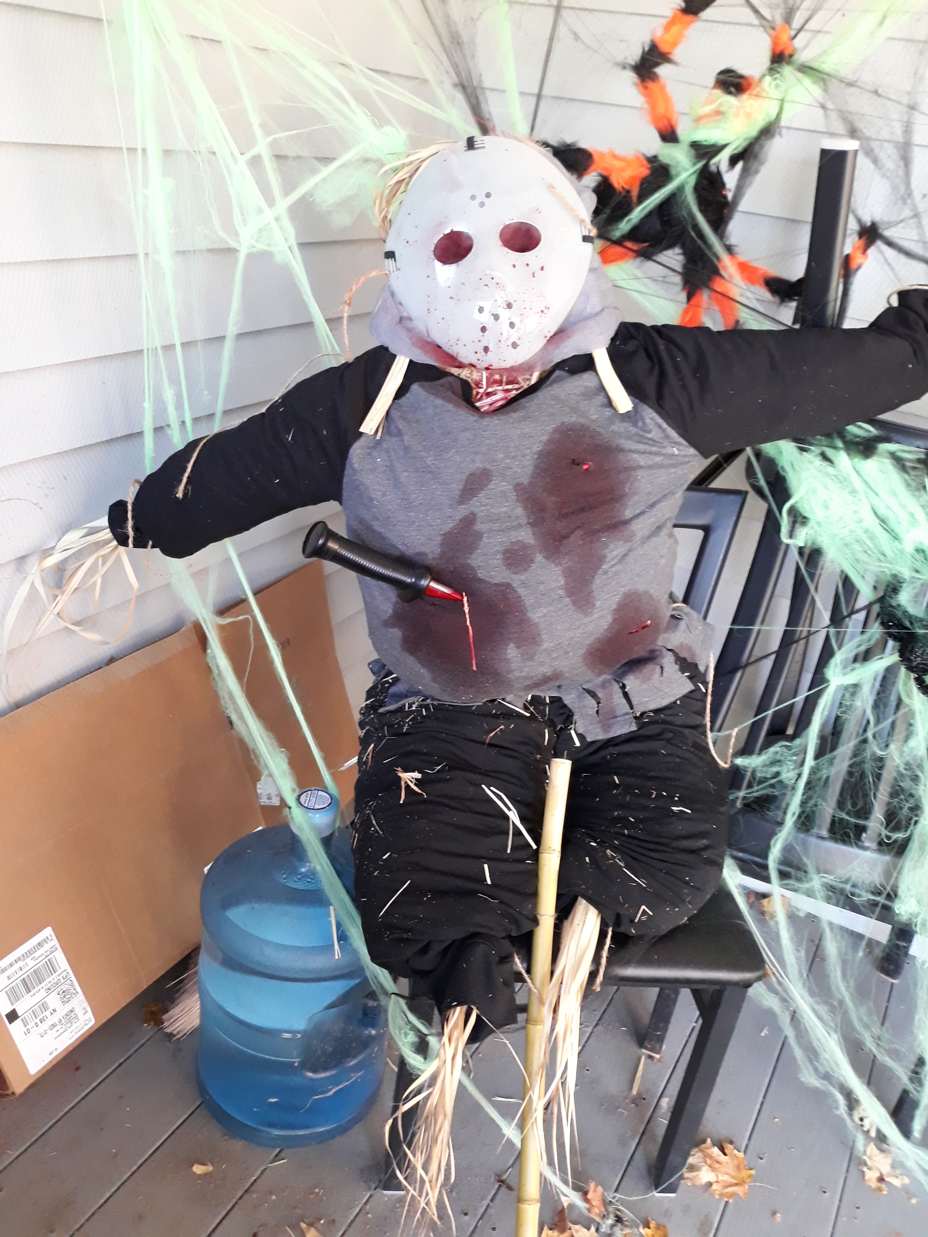 Kelly Corners scarecrow wearing a hockey mask
